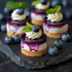 mini lemon blueberry cheesecakes - featured image