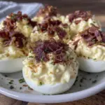 crispy classic deviled eggs with bacon topping - featured image